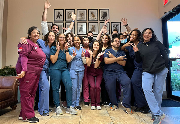 Flora Family Vet staff providing compassionate pet care in Kissimmee, FL